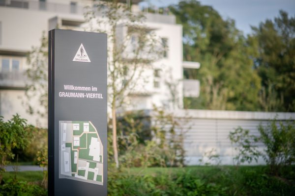 Schild mit Text: Willkommen im Graumann-Viertel